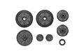 A set of black plastic RC car gears and components from Tamiya Parts Bag G, including bevel gears, a spur gear, and small pinion gears.