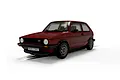 A red Scalextric 1/32 scale Volkswagen Golf GTI slot car viewed from the front three-quarter angle on a white background.
