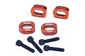 Four orange anodized aluminium motor mount spacers with GPM Racing branding and four black socket head screws on a white background.