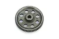 A grey steel 64T spur gear for RC cars, featuring a central hub and eight circular weight-reduction holes, isolated on a white background.