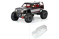 Pro-Line 1/6 Coyote Grand clear unpainted RC body shell shown alongside a fully painted and assembled RC crawler.