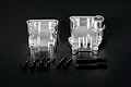 Rovan silver aluminium gearbox case set with included mounting screws and a pre-installed bearing on a black background.