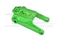 A green anodized aluminium servo protector part for RC vehicles by GPM Racing, featuring machined details and engraved text.