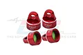 Four red GPM Racing aluminium shock caps for RC cars, featuring a 7075 alloy marking and internal green seals.