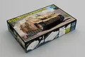 Trumpeter 1/16 scale StuG.III Ausf.G 1943 Production plastic model kit box showing box art of a camouflaged tank.
