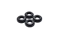 Four small black circular shock guides arranged in a cluster on a white background.