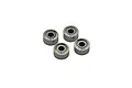 Four small metal shielded ball bearings arranged in a cluster against a white background.