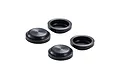 Four black RC shock bladders arranged on a white background, showing both top and bottom sides.