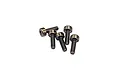 A cluster of five small metal cap head screws with hex sockets, arranged on a plain white background.