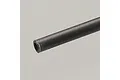 A close-up view of a single straight carbon fibre tube against a plain light grey background.