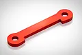 A red anodized aluminium suspension arm pin brace for an RC car, featuring a flat bar design with circular mounting holes at each end.