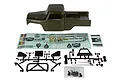 Element RC Enduro Ecto 1/10 scale green painted body shell with decal sheets and black plastic accessory parts on a white background.