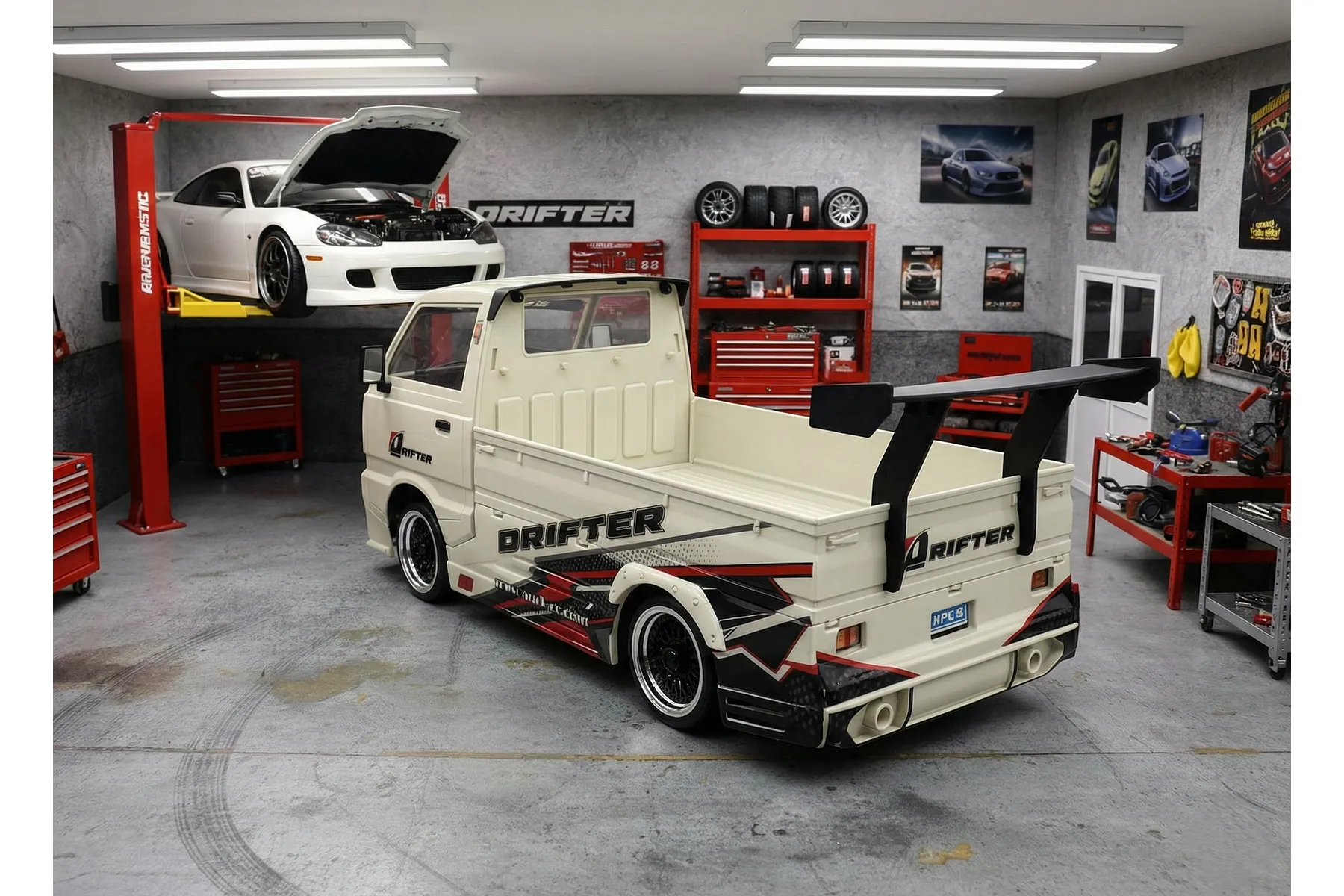 A white WPL D14S Suzuki Carry RC drift truck with a wide body kit and large rear spoiler, parked in a detailed miniature garage diorama.