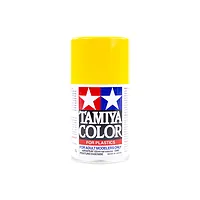 A 100ml can of Tamiya TS-34 Camel Yellow lacquer spray paint for plastic models, featuring the Tamiya logo and yellow cap against a white background.