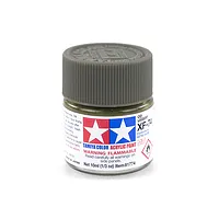 A 10ml jar of Tamiya XF-74 Olive Drab JGSDF flat acrylic paint with a dark green screw-top lid against a white background.