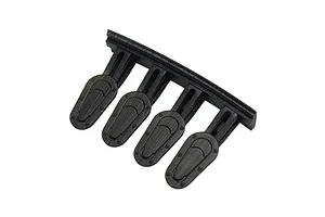 A set of four black 1/10 scale aero catches for RC car bodies, still attached to their plastic sprue frame.
