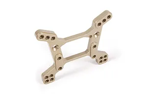 A gold-anodized aluminium RC shock tower with multiple mounting holes, shown from a high-angle perspective against a white background.