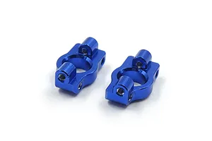 Two dark blue anodized aluminium RC front hub carriers (C-hubs) shown from an angled perspective on a white background.