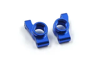 Two dark blue anodized aluminium RC rear hub carriers on a white background.