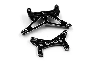 Two black anodized aluminium RC shock towers from Yeah Racing, showing machined edges and mounting holes.