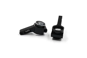 A pair of black anodized aluminium rear hubs for RC cars by Yeah Racing, featuring the YR logo engraved on the side.