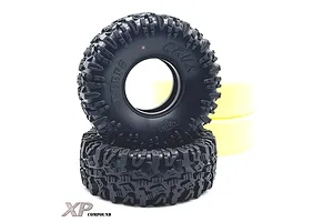Two black Reefs RC 1.9 inch Crux crawler tyres stacked vertically with yellow foam inserts visible behind them against a white background.