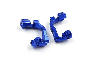 A pair of dark blue anodized aluminium C-hub carriers for RC cars, shown from a top-down perspective on a white background.