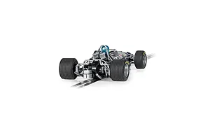 Rear view of a 1/32 scale Scalextric Brabham BT26 slot car in dark blue, showing the engine detail, driver helmet, and wide rear tires on a track section.