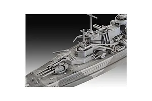 Close-up of the deck and superstructure of a 1/1200 scale Revell Gneisenau battleship plastic model kit, showing grey molded plastic details.