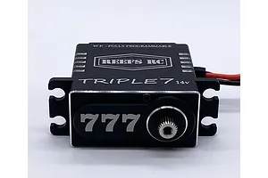 A black Reefs RC Triple 7 brushless servo with metal casing and silver accents, shown from the front against a white background.
