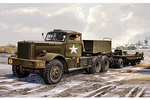 Box art illustration of a Revell M19 Tank Transporter truck in olive drab with two soldiers, set in a muddy field with industrial equipment in the background.