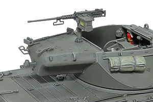 Close-up of a 1/35 scale Tamiya M36 tank destroyer model showing the turret, mounted .50 caliber machine gun, and detailed interior accessories.