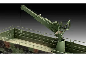 A close-up view of a green military truck model kit featuring a mounted crane assembly in the cargo bed.