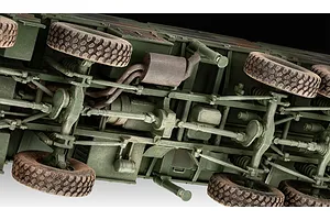 Underside view of a detailed 1/35 scale plastic model of a MAN 10T Milgl 8x8 military truck showing chassis, suspension, and exhaust details.