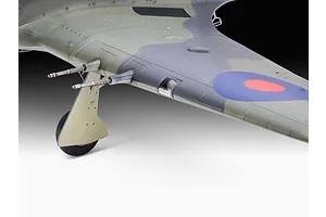 Close-up of the wing and landing gear of a 1/32 scale Hawker Sea Hurricane model aircraft featuring camouflage paint and RAF roundel.