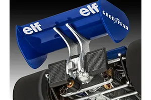 Close-up of the rear wing and engine detail of a Tyrrell P34 Formula 1 model car, featuring blue wing with elf and Goodyear branding.