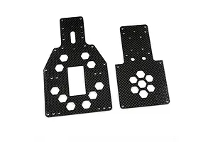 Two black carbon fiber RC chassis plates with hexagonal cutouts on a white background.