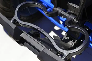 Close-up of an RPM branded black plastic rear bumper mount installed on an RC vehicle chassis.