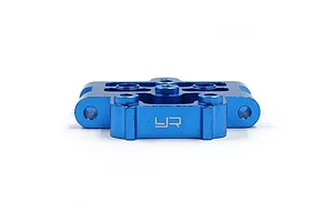 A blue anodized aluminium front lower suspension mount for an RC car, featuring the Yeah Racing logo engraved on the front face.