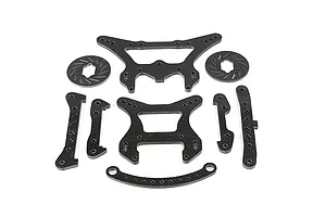 A set of Rovan carbon fibre RC car parts including shock towers, braces, and brake discs arranged on a white background.