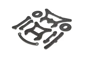 A set of Rovan carbon fibre RC car parts including shock towers, braces, and two brake discs arranged on a white background.