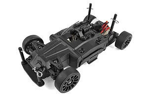 A high-angle studio shot of a black 1/27 scale RC car chassis without a body shell, showing the suspension, wheels, and motor mount.