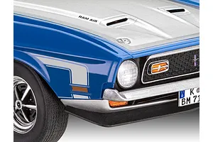 Close-up of the front passenger side of a blue and silver 1971 Ford Mustang Boss 351 scale model car.