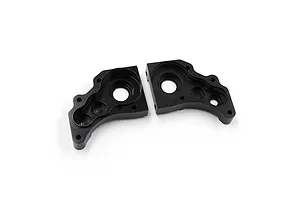 Two black anodized aluminium gearbox case halves for an RC car, shown from the interior side on a white background.