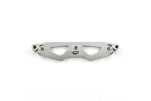A silver aluminium front shock tower for an RC car, featuring a flat, machined design with triangular cutouts and mounting holes.