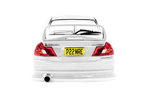 Rear view of a 1/10 scale white Mitsubishi Lancer Evolution IV RC car body shell featuring a rear spoiler, exhaust pipe, and yellow license plate.