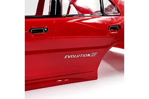 Close-up of a red painted RC Mitsubishi Lancer Evolution IV body shell showing the side door, handle, and Evolution IV decal.