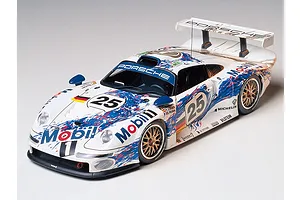 A fully assembled and painted 1/24 scale Tamiya Porsche 911 GT1 model car featuring the Mobil 1 racing livery with number 25.