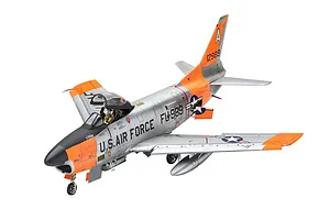 A completed 1/48 scale plastic model of a US Air Force F-86D Dog Sabre fighter jet, painted in silver and orange with a pilot figure in the open cockpit.