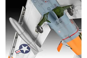 Underside view of a detailed 1/48 scale plastic model of an F-86D Dog Sabre fighter jet, showing landing gear, fuel tanks, and US military markings.